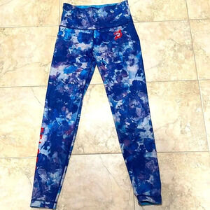 Peloton reversable leggings purple blue.  Size M